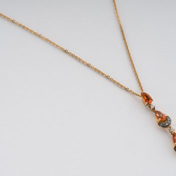 Pendente tre gocce in oro rosa con granato mandarino diamanti chocolate e diamanti bianchi
