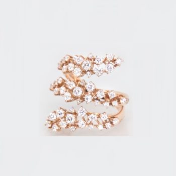 Anello "onda" oro rosa e diamanti